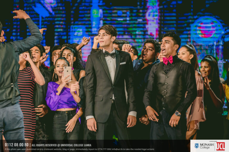 UCL students on stage at a student event